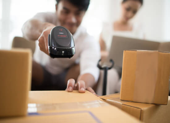 Packers and Movers in Dubai packing items for movement from one place to another